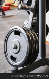 Barbell plates holder rack in the gym