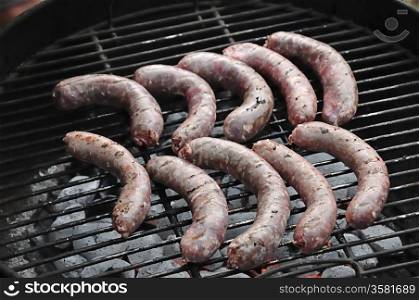 Barbeque fire with sausages