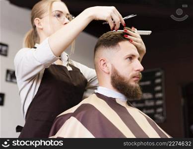 barber shop worker doing her job