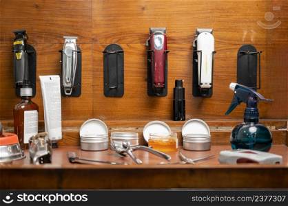 barber tools on the shelf in the barbershop. High quality photography.. barber tools on the shelf in the barbershop.