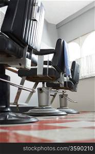Barbers chairs in a row