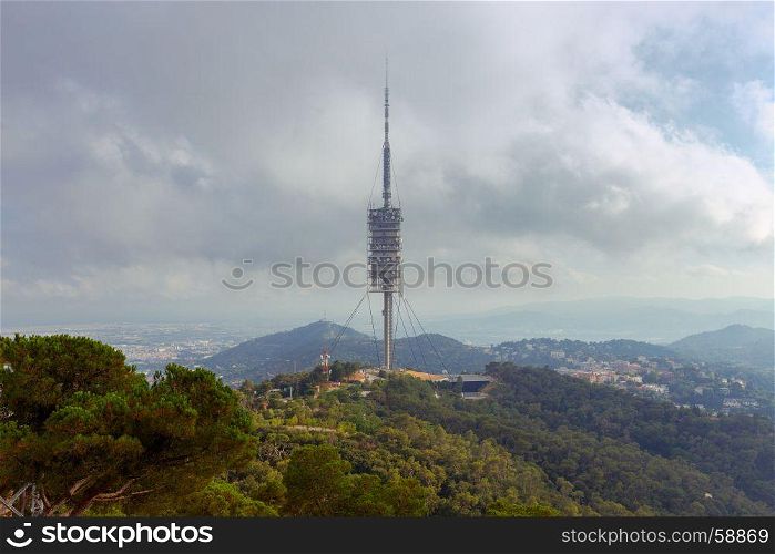 Barcelona. A television tower in the park of Collserola.. A television communications tower on Mount Tibidabo. Barcelona. Spain.