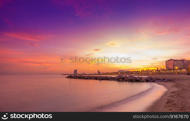 Barcelona beach at the sunset