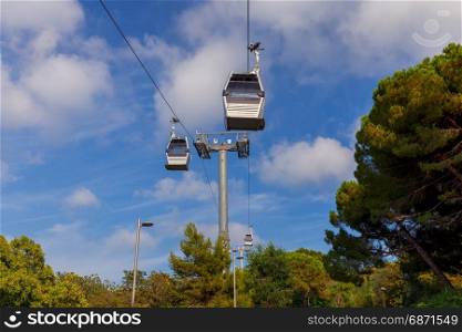 Barcelona. Cable car.. View of the cable car above the hill of Montjuic. Barcelona. Spain.