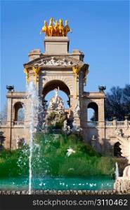 Barcelona ciudadela park lake fountain with golden quadriga of Aurora