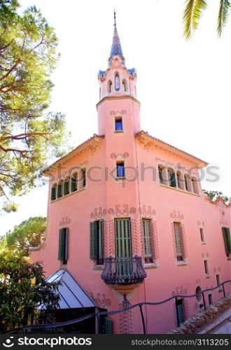 Barcelona house of Gaudi in Park Guell pink facade building