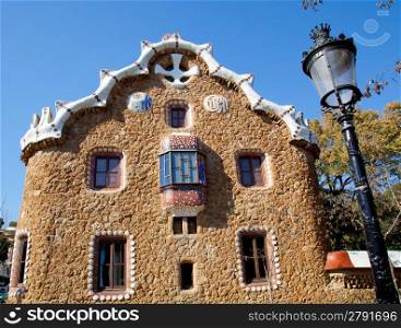 Barcelona park Guell fairy tale mosaic house on entrance