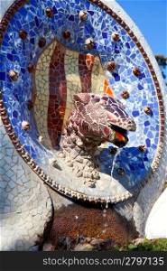 Barcelona Park Guell of Gaudi Snake and four Catalan bars in modernism mosaic