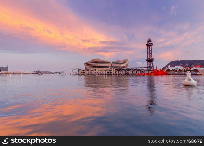 Barcelona. Seaport at sunset.. View of the seaport and the city embankment at sunset. Barcelona. Spain.
