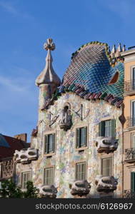 BARCELONA, SPAIN - 11 MAY, 2010: Casa Batllo on MAY, 2010, a famous tourist destination restored by catalan architect Antoni Gaudi. Facade is decorated with mosaic tiles