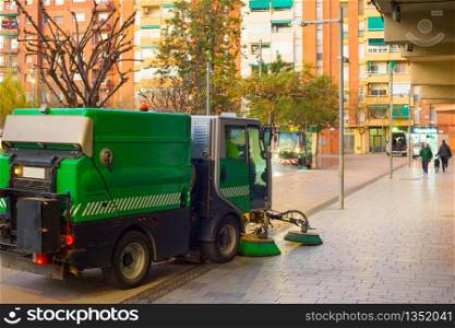 BARCELONA, SPAIN - JAN 27, 2020: Cleaning car clean city streets in the morning. Barcelona, Spain
