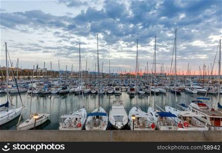 Barcelona. Yachts and boats in the Olympic port.. Yachts and boats in the water area of the Olympic port at sunrise. Barcelona. Spain.