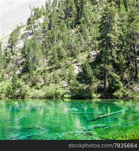 Bardonecchia, Italy. The Green Lake, Alpine lake with fluo color due to a local seaweed
