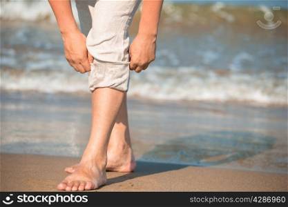 barefoot male tuck pants not to wet
