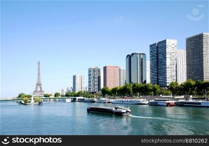 barge on the Seine and Eiffel tower, Paris, France