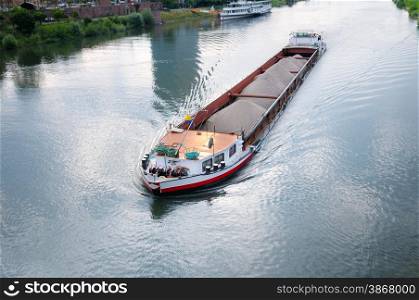 barge with cargo on river