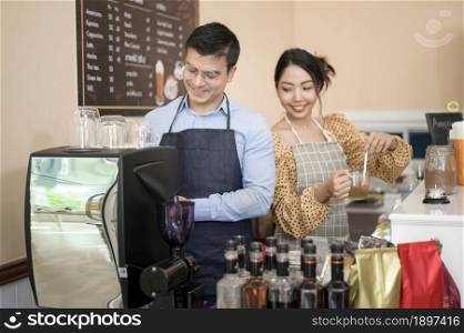 Baristas making and preparing a cup of coffee in coffee shop