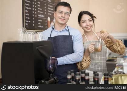 Baristas making and preparing a cup of coffee in coffee shop