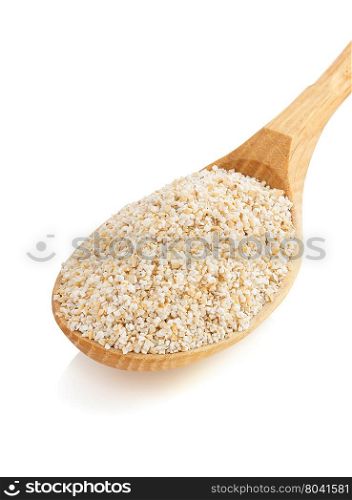 barley in spoon isolated on white background