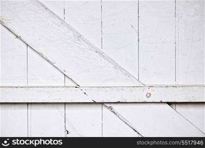 Barn door background. Background of old wooden barn door painted white