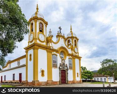 Baroque church facade with its towers in downtown of the historic city of Tiradentes in Minas Gerais. Baroque church facade with its towers