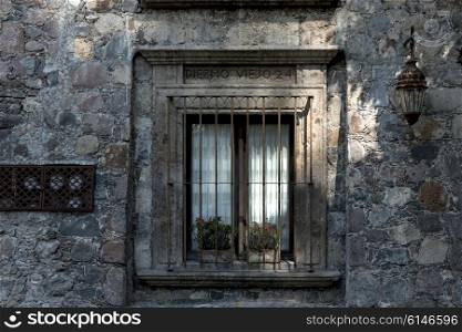 Barred window of a house, Zona Centro, San Miguel de Allende, Guanajuato, Mexico