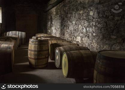 Barrels of malt whisky in an Irish Distillery. Whiskies do not mature in the bottle, only in the cask, so the age of a whisky is only the time between distillation and bottling.