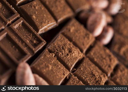 Bars Chocolate , candy sweet, dessert food on wooden background. Aromatic cocoa and chocolate on wooden background