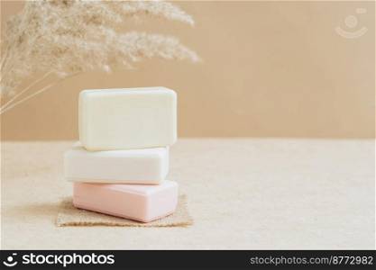 Bars of soap made from natural raw materials beige background. Organic cosmetics. Spa health concept natural cosmetics. Bars of soap made from natural raw materials beige background. Organic cosmetics Spa health concept natural cosmetics