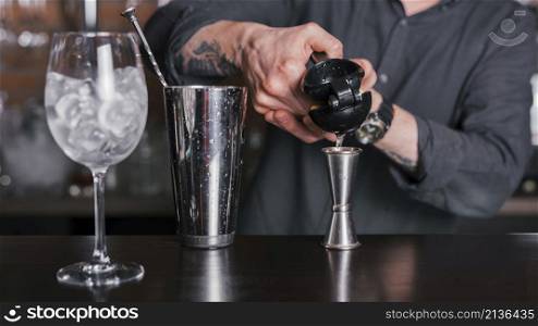 bartender preparing refreshing cocktail