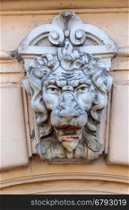 Bas-relief of lion's head on the wall of old building in Odessa, Ukraine