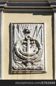 Bas-relief of ship's anchor on the wall of old building in Odessa, Ukraine