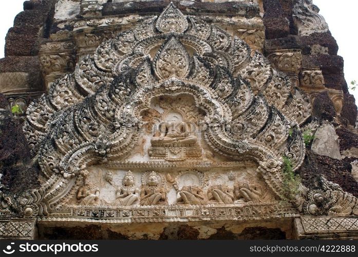 Bas-relief on the pagoda in wat Phra Phai Luang, old Sukhotai, Thailand