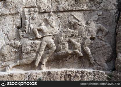 Bas-relief on the royal tomb in Naqsh-e Rostam near Persepolis, Iran