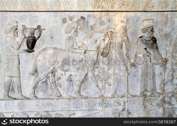 Bas-relief on the wall of palace in Persepolis, Iran