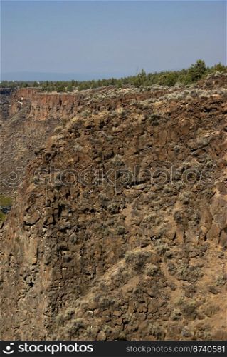 Basalt cliffs and talus from ancient lava flow, Crooked River Canyon, Central Oregon