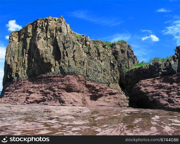 Basalt on sandstone. Basalt on red sandstone, rare geological formation