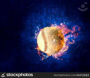 Baseball game concept with ball in fire flames. Mixed media. Ball burning in fire