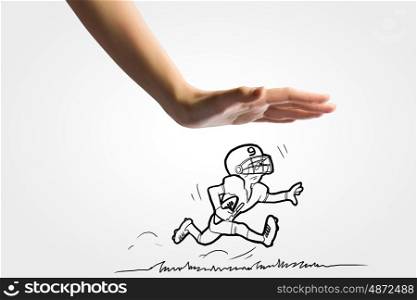 Baseball player. Close up of human hand and caricature of running baseball player