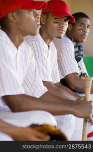 Baseball Players Sitting in Dugout