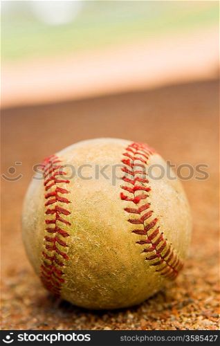 Baseball Sitting on Dirt