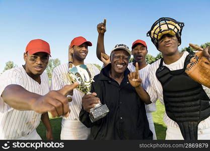 Baseball Team and Coach Celebrating Victory