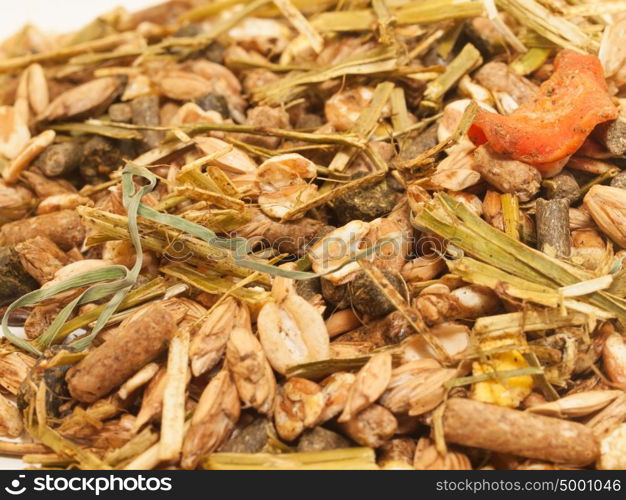 basic muesli with herbs for horse background. close up