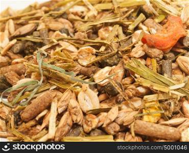 basic muesli with herbs for horse background. close up