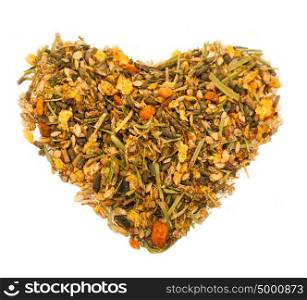 basic muesli with herbs for horse background . in form of heart. isolated