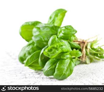 Basil leaves on kitchen table