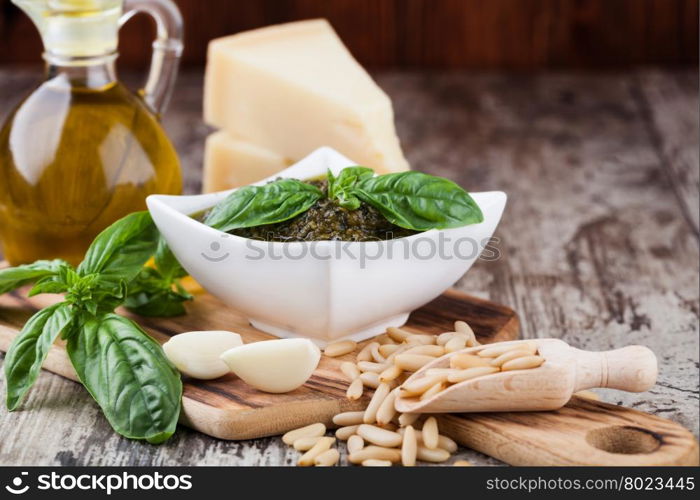 Basil pesto in a small bowl. homemade pesto of green herbs