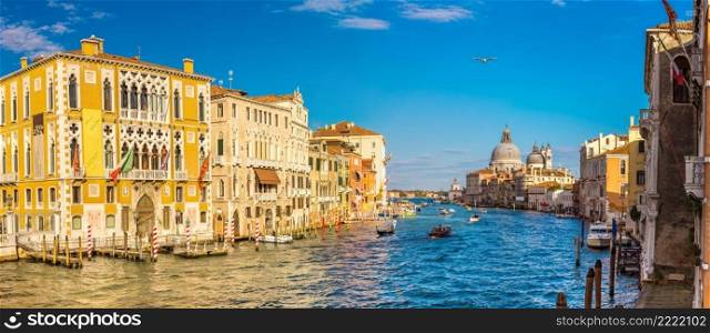 Basilica Santa Maria della Salute and Grand Canal in Venice in a beautiful summer day in Italy