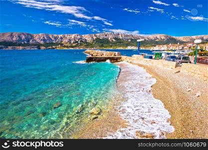 Baska. Idyllic pebble beach and town of Baska view, Island of Krk in Kvarner bay of Croatia