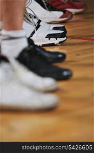 basket ball players team portrait in hi-school sport gym